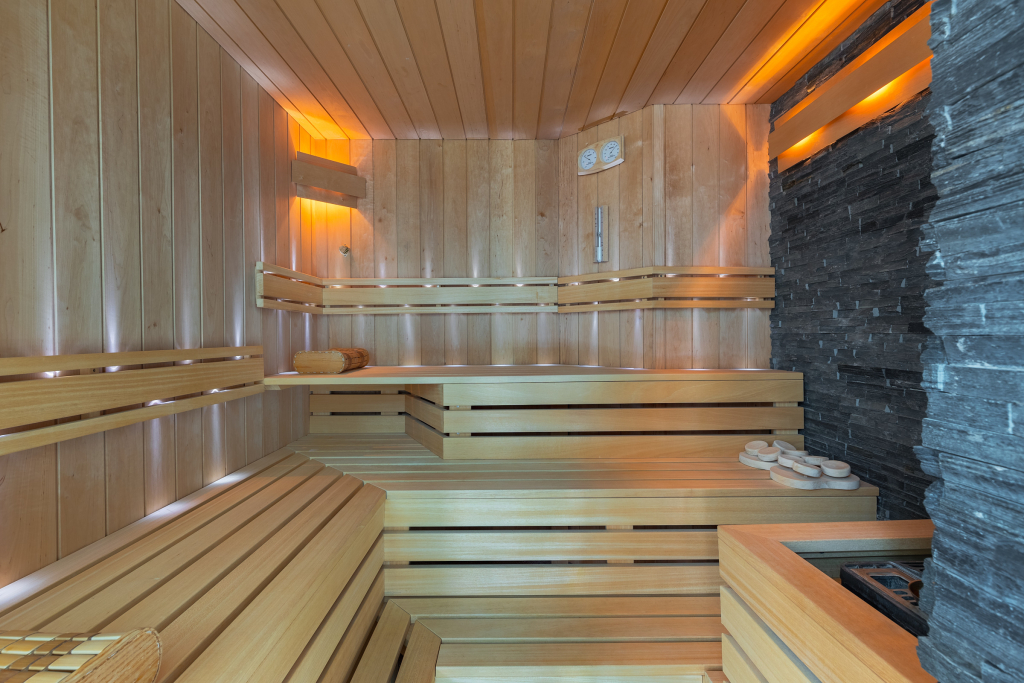 Interior image of a sauna with various lighting systems.