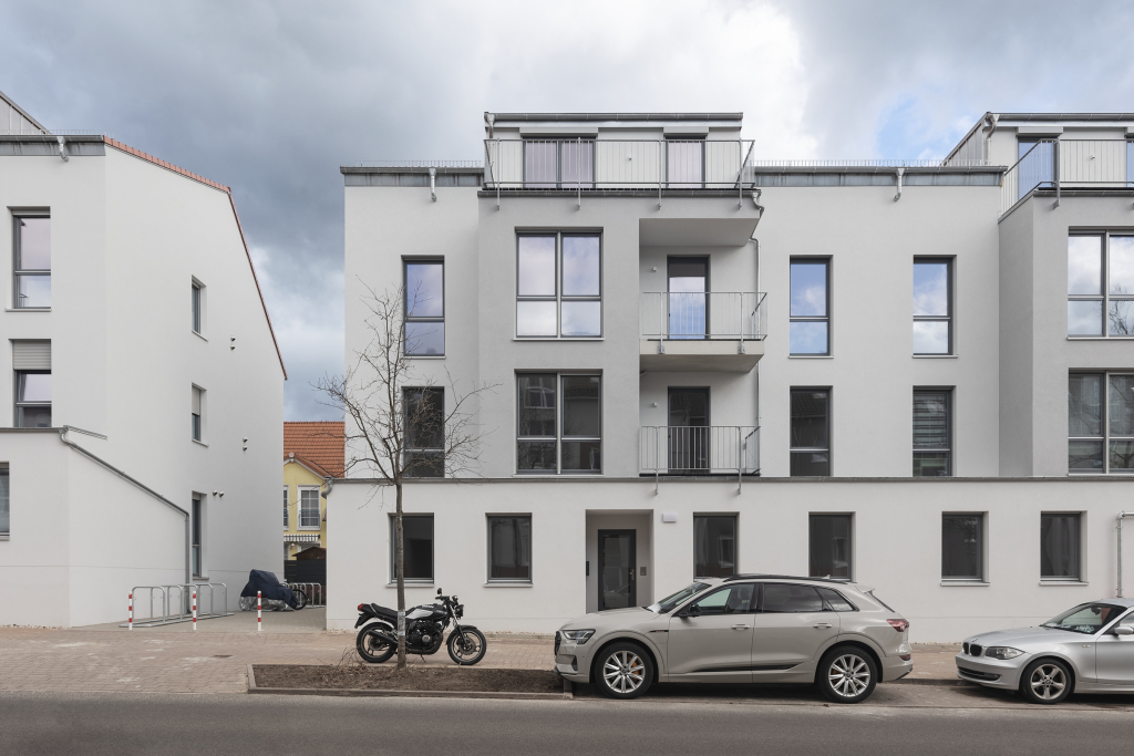 Front view of a three story apartment complex in Hoppegarten, Brandenburg.