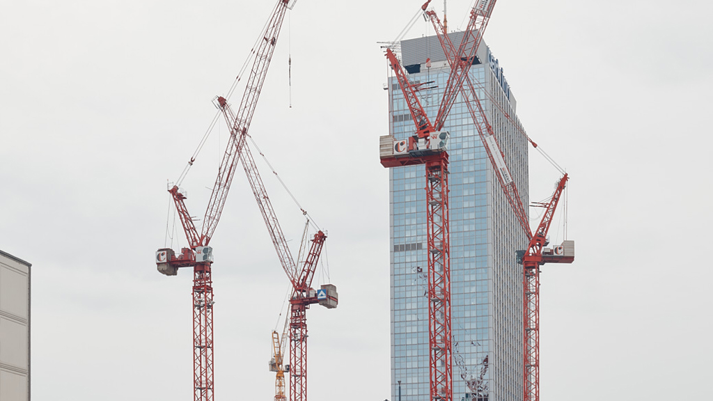 Stitched panoramic image of active construction site near Alexanderplatz, coordinated by Tiefbau and Covivio in Berlin.