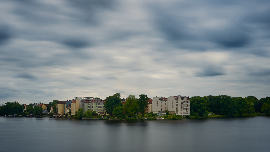 Residential area bathed in soft light with parks enveloping the buildings, captured in long exposure in Köpenick, Berlin.