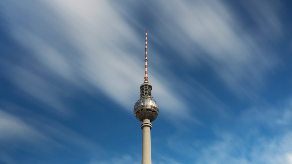 Berlin TV Tower photographed with a long exposure during early afternoon hours.
